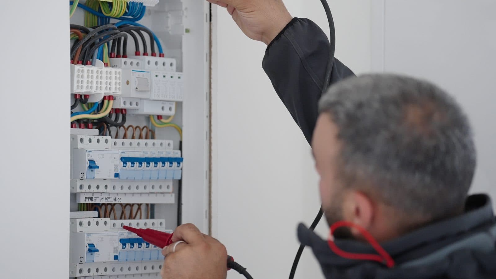 Close-up: circuit breakers and wiring in the distribution board