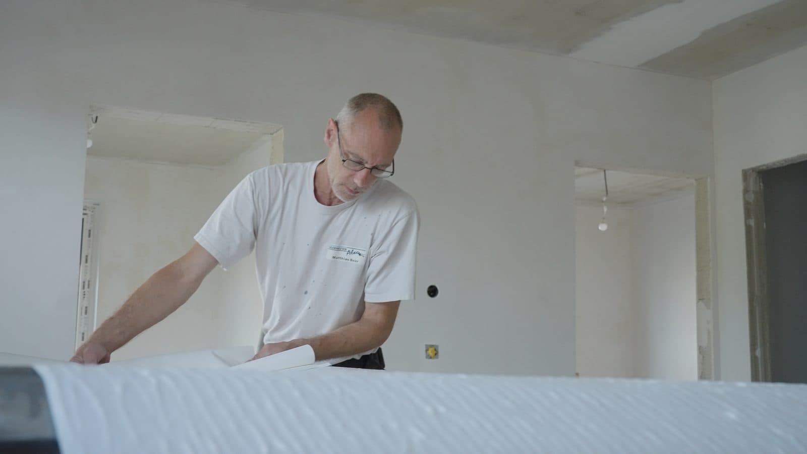 Craftsman working on the interior fit-out of a refurbished building